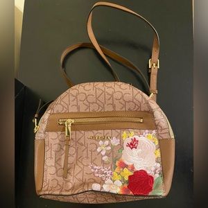 Calvin Klein small back pack, embroidery detailed front